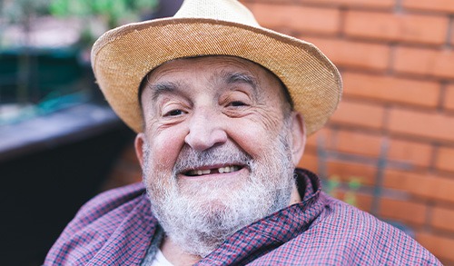 San Marcos patient discussing dentures with dental team