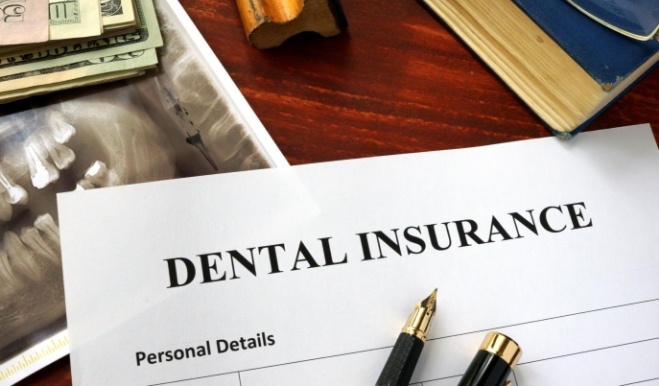 Dental insurance paperwork on desk