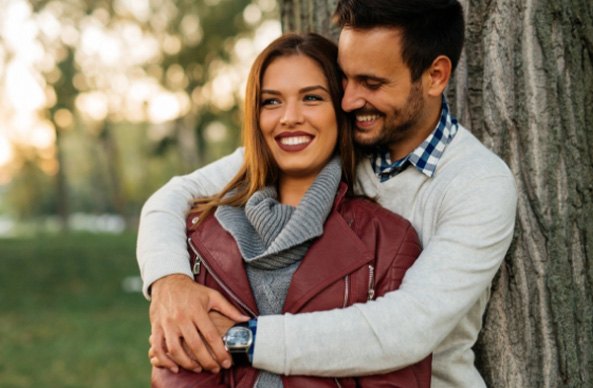 man and woman smiling together in Family Dental Center of East Texas   