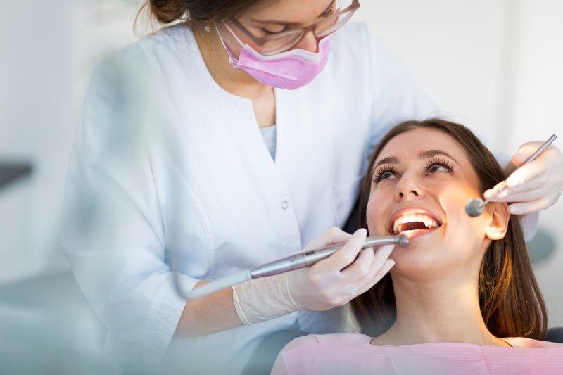 A dentist in San Marcos treating a patient