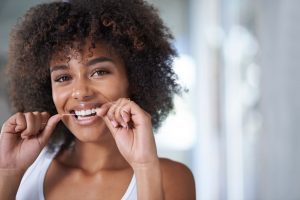 woman flossing 