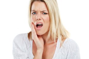 woman with mouth pain